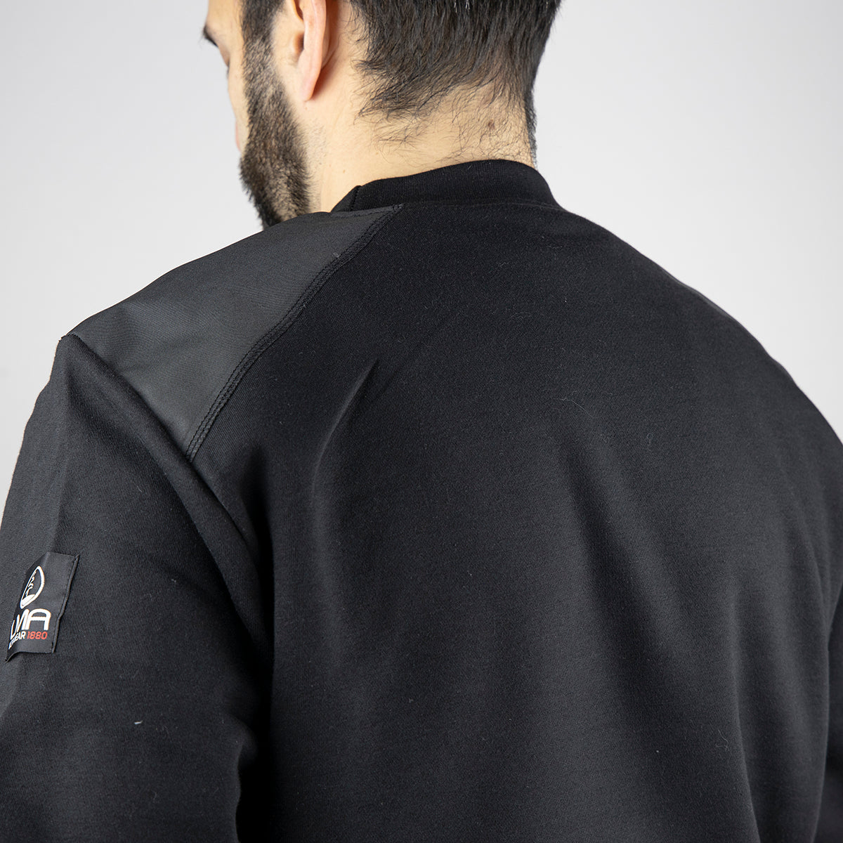 Chandail Bruxelles Hugo Strong #8091 pour homme. Confort en molleton chaud, renforts Oxford 300D et style noir sobre pour travail et quotidien.